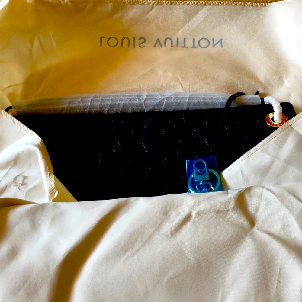 Louis Vuitton large tote bag.